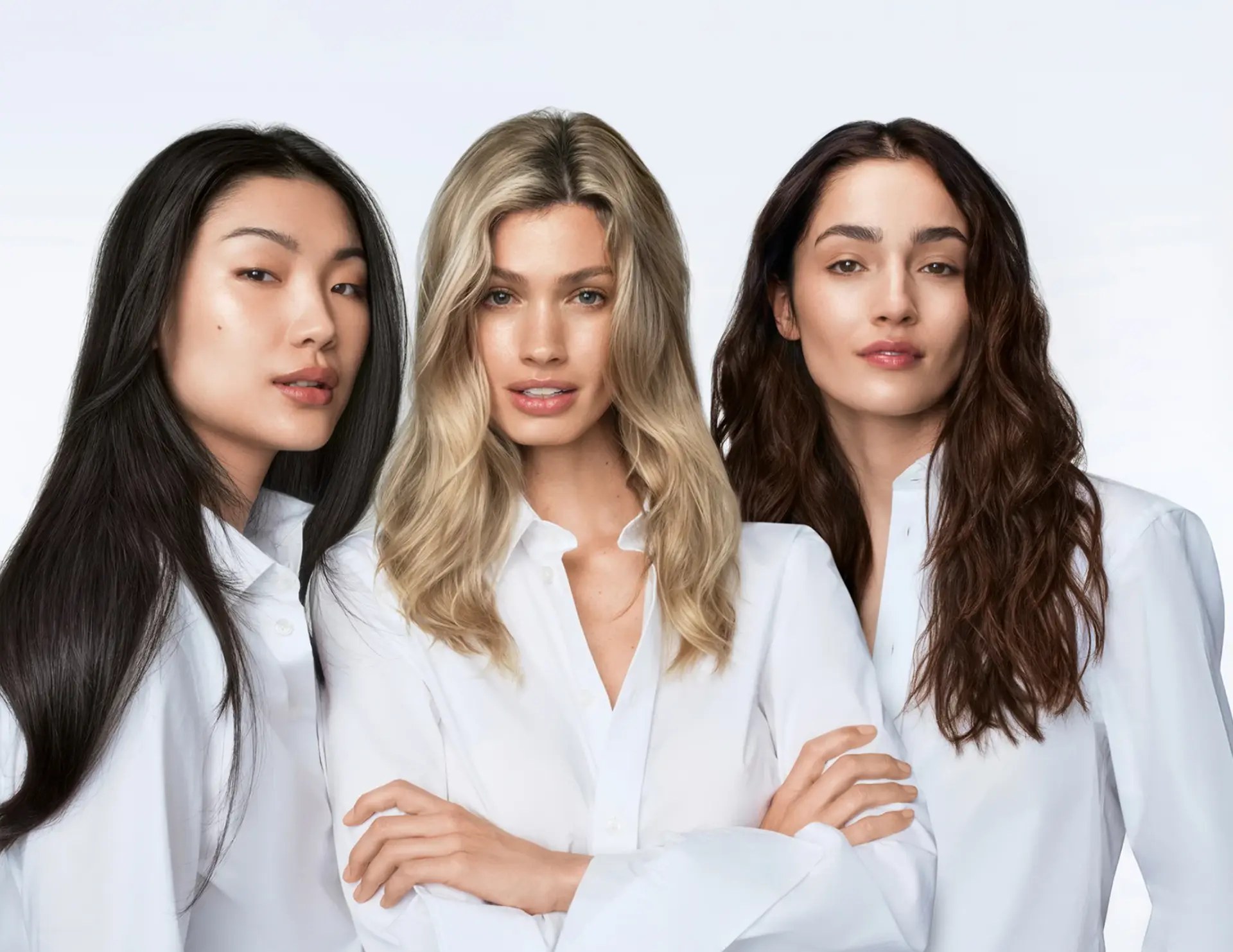 Three models with Keune hair colour in blonde, brunette and deep brunette, the colour line used at Wicked Hair salon in Utah