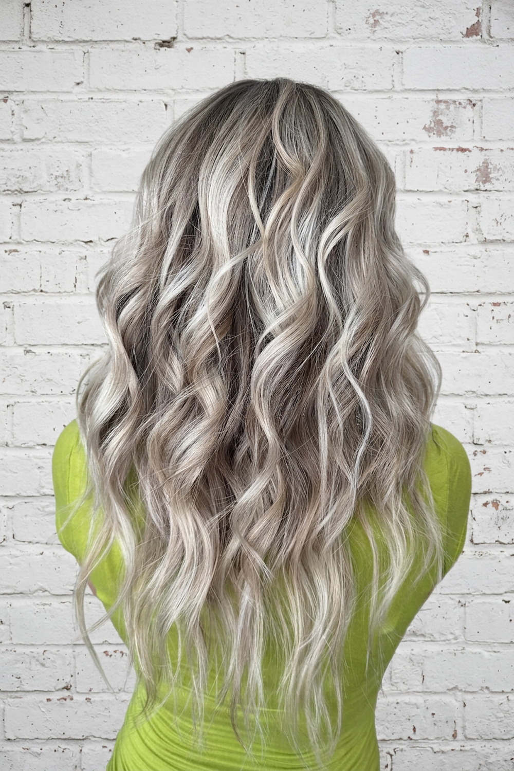 Cool silver-white and ash blonde waves, corrective blonde color work in Draper Utah.