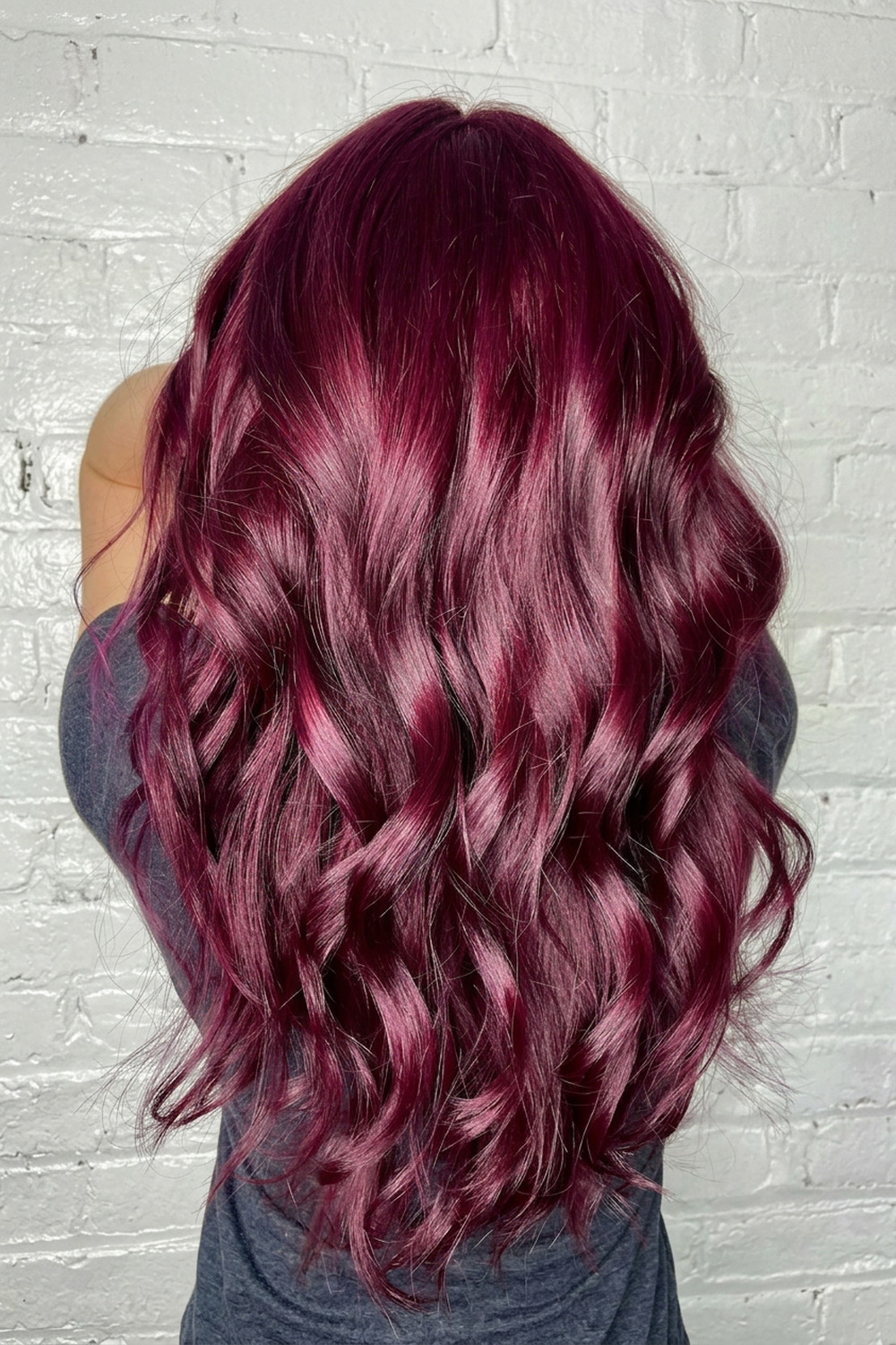 Berry magenta and burgundy long wavy hair colour, vivid colour specialist serving Draper and Sandy, Utah.